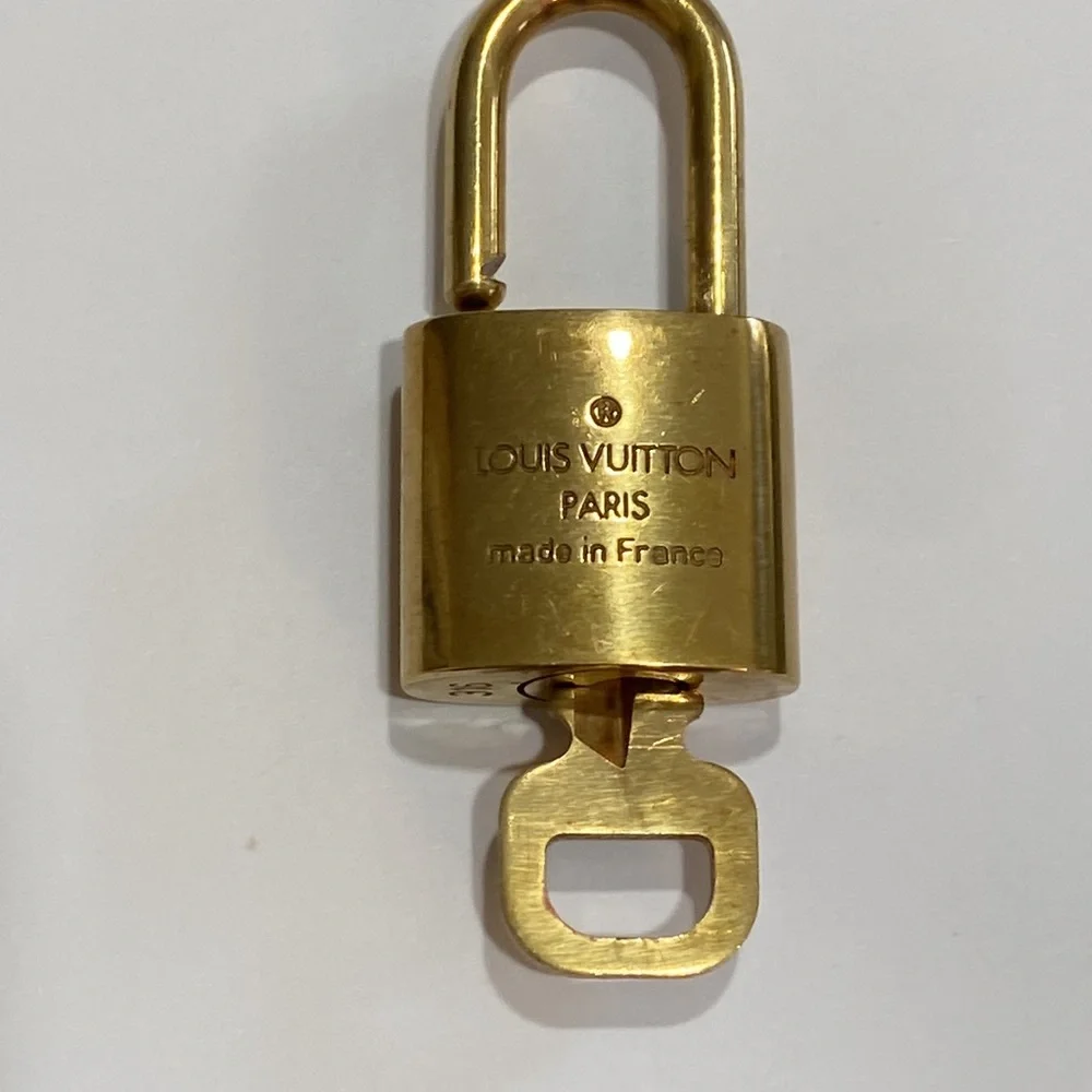 #316 LV lock key March 16 Louis Vuitton gold tone brass Anniversary Birthday